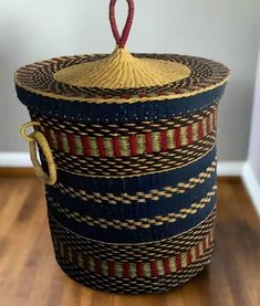 Description: Our handmade laundry baskets are crafted by local artisans in Ghana from natural elephant grass and dyed with eco-friendly colors. Because each item is handmade, variations in color and design may occur, making every basket unique and special in its own right. While they may not look exactly like the pictures, they are inspired by them and remain beautiful and distinctive additions to your home. Some handles are wrapped in durable leather for added strength. Shipping: Each basket is made to order, taking about 7 to 14 days to process. Shipping typically adds another 1 to 2 weeks, so your basket may arrive within 2 to 4 weeks from ordering. We recommend ordering in advance for timely delivery. Dimensions: Please select from the available size variations. If you require a custom Water Shape, Woven Laundry Basket, Laundry Hamper With Lid, Laundry Solutions, Laundry Baskets, Woven Basket, Laundry Hamper, Stylish Storage, Local Artisans