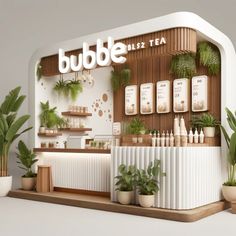 a display case with plants and bottles on the wall, in front of it is a sign that says bubble buzz tea