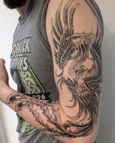 a man with a tattoo on his arm