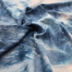 a blue and white tie dyed fabric