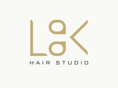 the logo for hair studio, which has been designed to look like it is in gold