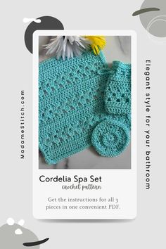 the crocheted spa set is shown in blue and has two flowers on it