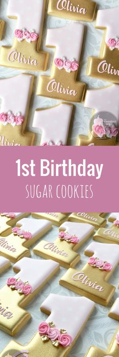 the first birthday sugar cookies are decorated with pink and gold icing, roses on them