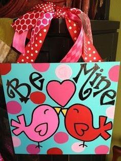 a bag that has been decorated with pink and blue polka dots, birds and hearts