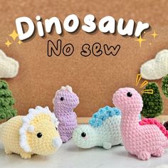 small crocheted dinosaurs are lined up in front of a sign that says dinosaur no sew