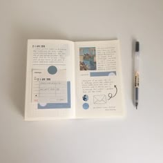 an open notebook with writing on it next to a pen