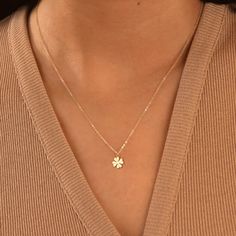 Discover the delicate allure of our Dainty Clover Necklace--a symbol of luck and charm crafted in your choice of gold filled, sterling silver, or rose gold filled. This exquisite necklace seamlessly combines elegance and whimsy, making it a perfect addition to your everyday wardrobe. 🍀 Symbol of Luck: The dainty clover pendant is a timeless symbol of good fortune. Wearing this necklace not only adds a touch of sophistication to your style but also invites positive energy and luck into your life. * We use the Highest Quality materials from the US and Italy. * Your purchase will come packaged and ready for gift giving! M A K E S * A * P E R F E C T * G I F T : ) * * * * * * * * * * * * * * * * * * * * * * * * * D E T A I L S * 8.5mm x 10.3mm Clover Pendant * 14K Gold Filled, 14K Rose Gold F Clover Necklace Aesthetic, Shamrock Wedding, White Clover Necklace, Jewellery Stack, Good Luck Clover, Shamrock Necklace, Four Leaf Clover Necklace Silver, Four Leaf Clover Locket, Luck Necklace