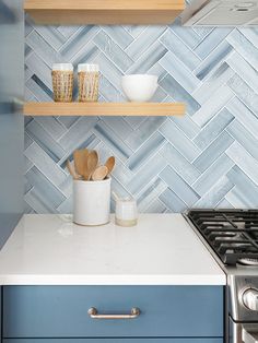 the kitchen counter is clean and ready to be used as a shelf for cooking utensils