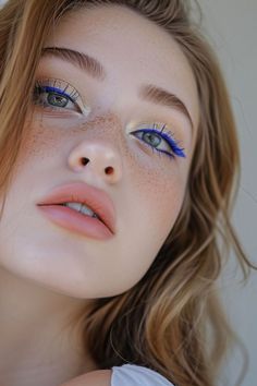 In love with the blue eyeshadow aesthetic?? Blue eyeshadow, often deemed as a blast from the ’80s past, is making a fierce comeback, and we’re here for it! Forget the hesitations; there’s a blue eyeshadow look waiting to steal your heart, no matter your eye color or skin tone. We’ve curated a collection of these stunning looks, and trust me, you’re in for a treat. Whether you're looking for an everyday eyeshadow look, Prom makeup, Blue quince makeup, or something else, you'll fall in love! Feminine Essence, Blue Makeup Looks, Face Charts, Make Up Tutorials, Old Makeup, Doe Eyes, Ethereal Makeup, Blue Eyeshadow, Bee Art