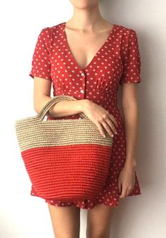 Stylish and colorful, this vibrant red handwoven tote is made by artisans from Santander, Colombia. 100% made of Fique natural fiber, a plant similar to Agave, it is the perfect summer accessory to be used out in the city or to spend a day at the beach. With the easy to carry handles, you will want to carry it around everywhere you go!Approximate Measurements:Width (top): 15.5” / 40 cmWidth (middle): 14" / 35 cmBase Diameter: 9.8” / 25cmHeight: 13" / 33 cmAll of our bags are 100% handmade from n Summer Shopping Crochet Bag With Rolled Handles, Handmade Red Bucket Crochet Bag, Red Handwoven Rectangular Straw Bag, Handmade Red Crochet Bucket Bag, Red Beach Bag With Double Handle, Red Handmade Crochet Bucket Bag, Summer Top Handle Crochet Shopping Bag, Eco-friendly Red Bag For Everyday Use, Eco-friendly Red Bags For Everyday Use