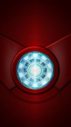 an iron man symbol in the center of a red circle with light coming from it