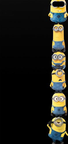 a group of minion toy figures sitting on top of each other