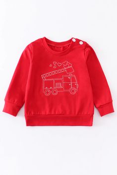 This fire truck embroidery boy top will make your little one look adorable. Featuring bold red color and convenient buttons on the sleeve, this shirt is a perfect addition to your child's wardrobe. Easy to wear, comfortable, and stylish - it's a must-have! 95%Cotton / 5% Spandex Red Long Sleeve T-shirt With Cartoon Print, Red Crew Neck Top For Playtime, Red Long-sleeve T-shirt With Cartoon Print, Red Tops For Fall Playtime, Truck Embroidery, Sibling Outfits, Red Embroidery, Exclusive Dress, Kids Graphic Tees