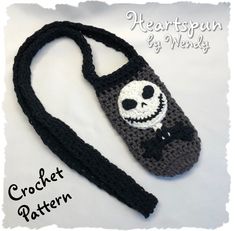 a crocheted bag with a skeleton on it