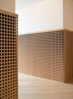 the wall is made out of wooden squares