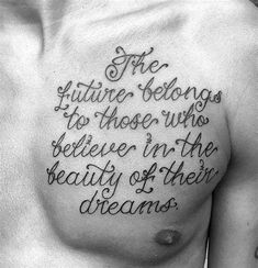 a man's chest with some words written in black ink on the side of his chest