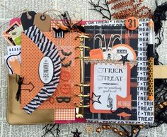 an open book with lots of different things on it's cover and the words trick or treat written in black