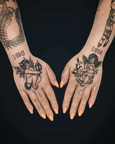 two hands that have tattoos on them, one with an angel and the other with cherubs