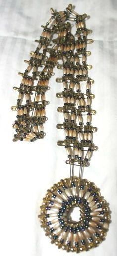 Vintage 70's Safety Pin And Bead Necklace | eBay Vintage Beaded Chain For Festivals, Vintage Multi-strand Beaded Chain Necklaces, Retro Beaded Jewelry For Festivals, Retro Beaded Jewelry With Round Beads, Retro Beaded Round Jewelry, Retro Round Beaded Jewelry, Vintage Polished Bead Jewelry For Festivals, Vintage Polished Beads Jewelry For Festival, Vintage Jewelry With Polished Beads For Festivals