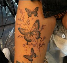 butterfly tattoo with three butterflies with plants Earthy Butterfly Tattoo, Butterfly Goddess Tattoo, Butterfly Tree Tattoo, Multiple Butterflies Tattoo, Butterfly Tattoo Different, Thigh Tattoos Butterfly, Butterfly Cluster Tattoo, Groovy Chick Tattoo, Tattoos Dedicated To Siblings