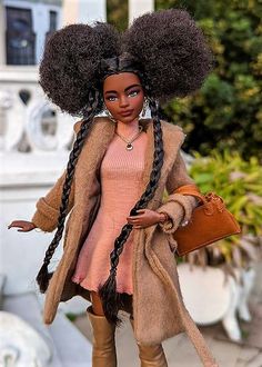 a barbie doll is walking down the street with her hair in an afro style wig