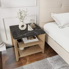 a marble topped end table in a bedroom