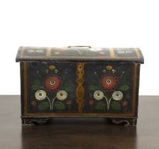 an old wooden box with painted flowers on it