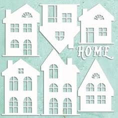 some cut outs that say home with windows and the word home on them in white