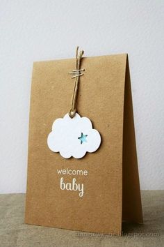 a welcome baby card with a cloud on it