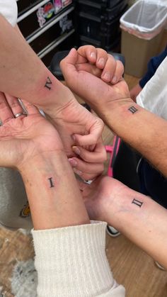 Birth order Roman numerals matching sibling tattoo 4 Siblings Matching Tattoos, Sibling Tattoo For 4 Ideas, Sibling Tattoos Roman Numerals, Sibling Roman Numeral Tattoo, Tattoo Ideas Siblings Four, Roman Numeral Matching Tattoo, 4 Way Matching Tattoos, Tattoo For Group Of 4, 4 Matching Tattoos Friends