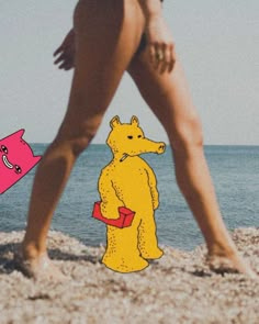 a woman walking on the beach next to an image of a yellow bear and pink pig