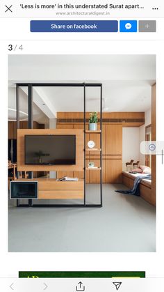 an image of a living room with furniture on the floor and in front of it is a flat screen tv