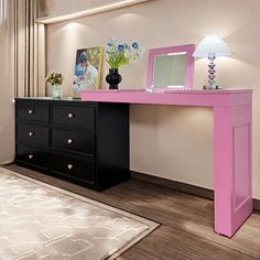 a pink and black desk in a living room