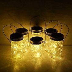 PRICES MAY VARY. Beautiful & Romantic Lights: Transform mason jars into fairy lights for romantic ambiance Solar Powered: 100% solar powered with no external wiring Energy Saving & Environment Friendly: Reuse mason jars and save energy Convenient & Safe: Automatically turn on/off with smart light sensor Pack of 6: Get 6 units with 10 LED lights and hangers for decoration ♥With this mason jar lights, you could make full use of your mason jar to DIY the beautiful garden decor, deck decor, patio de Lights And Mason Jars, Solar Power Mason Jar Lights, String Lights In Mason Jar, Christmas Mason Jar With Fairy Lights, Mason Jar String Lights, Mason Jar Lights, Solar Mason Jars, Backyard Dreams, Led Fairy String Lights