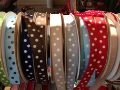 several different colored polka dot ribbon on display