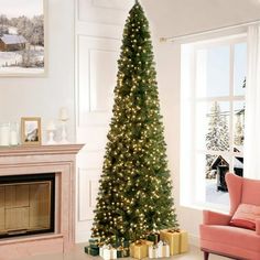 a living room with a christmas tree in the corner