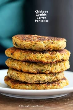 stack of chickpea zucchini patties on a white plate with text overlay