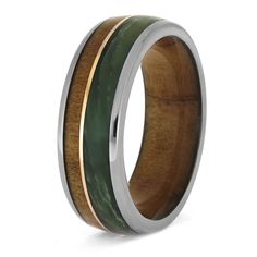 a wedding ring with wood and green inlay