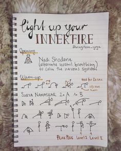 a notepad with writing on it that says light up your inner fire, and various symbols