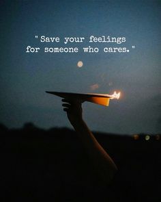 someone holding a plate with a lit candle in it that says save your feelings for someone who cares