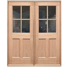 an image of two wooden doors with glass on the front and side panels in light wood