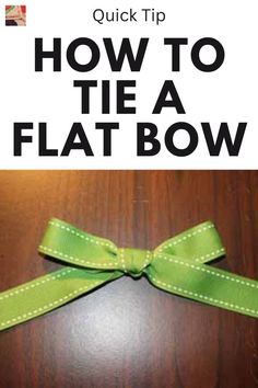 a green bow with the words how to tie a flat bow on it's side