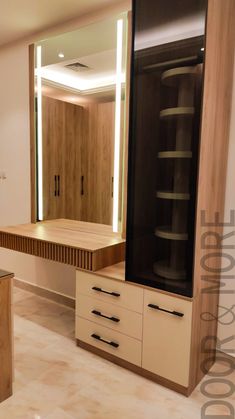 a bathroom with a large mirror and wooden cabinets