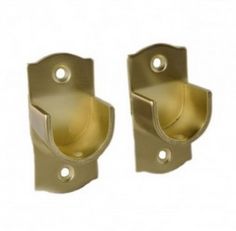 pair of brass plated door handles on white background