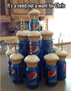 cupcakes with candles are stacked on top of pepsi cans and the caption it's a need not a want for girls