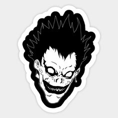 the joker sticker is black and white with an evil clown's face on it