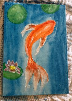 a painting of a goldfish and lily pads