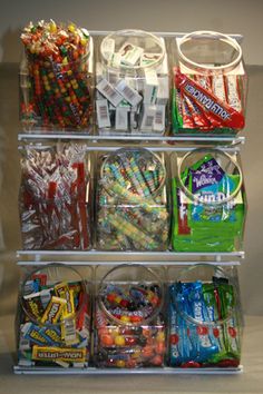 a shelf filled with lots of different types of candy