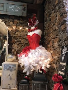 a red and white dress on display in a store