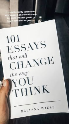 a person holding up a book with the title 101 ways that will change the way you think